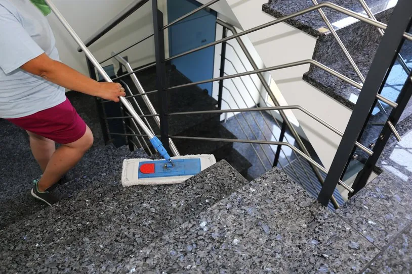 Professional staircase cleaning in a building
